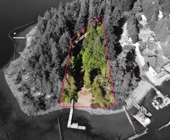 Aerial view of a waterfront property outlined in red for assessment appeal.
